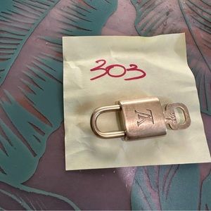 Louis Vuitton Lock and Key 303